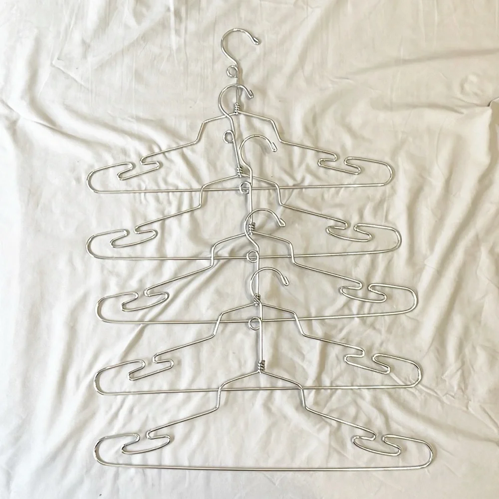 Set of 5 silver stainless steel top hangers for clothes